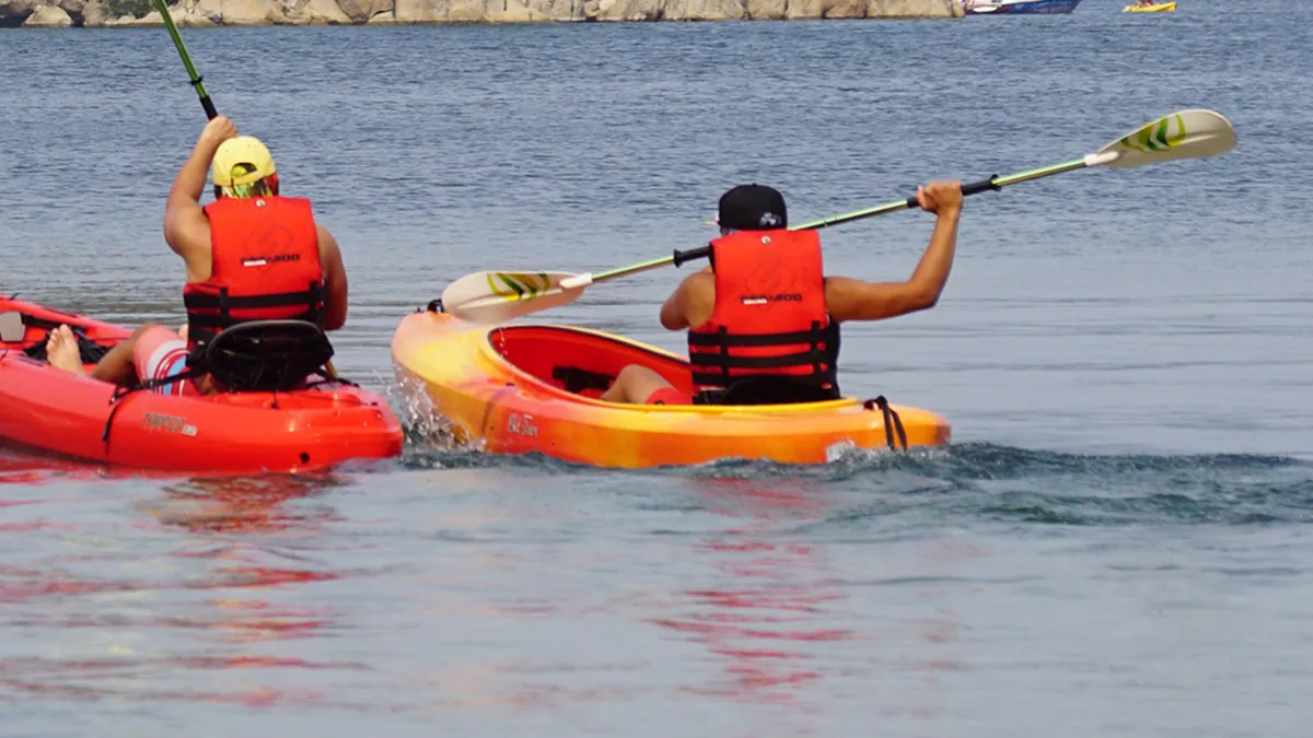 Three-day national kayaking and canoeing competitions commenced at Pearl City Beach on Friday