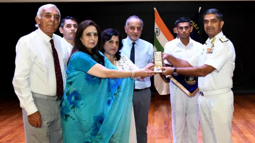 Daughters of late Captain Mahendra Nath Mulla, MVC (Posthumous), handed over the original Maha Vir Chakra to the INA